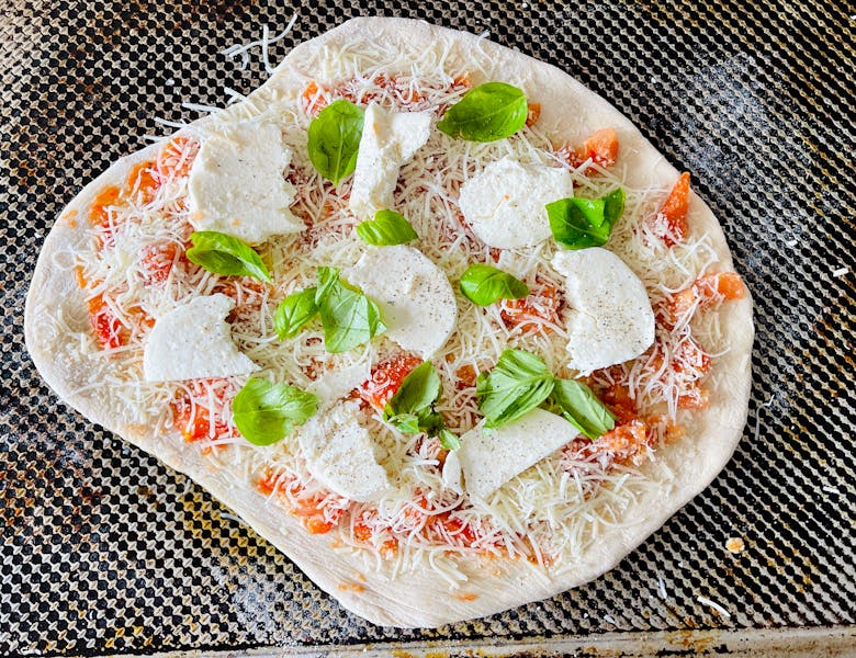 Pizza inn signature pepperoni pizza fresh from the oven