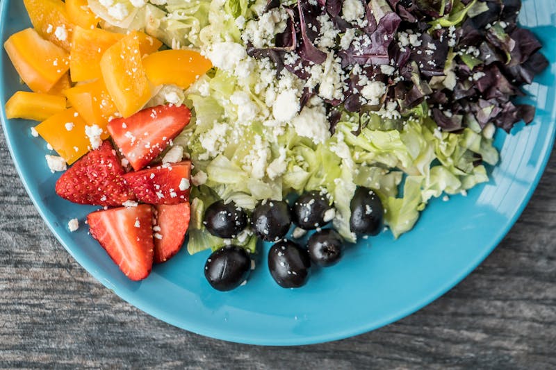 Greek salad with feta cheese, olives, and fresh vegetables